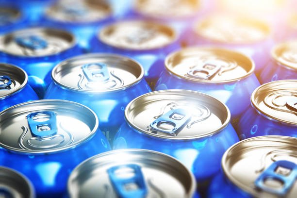 Creative abstract 3D render illustration of the macro view of blue metal shiny drink tin cans with soda refreshing beverages selective focus bokeh effect